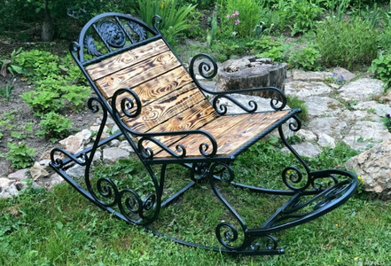 Кресло на основе из кованных завитков Кресло на основе из кованных завитков